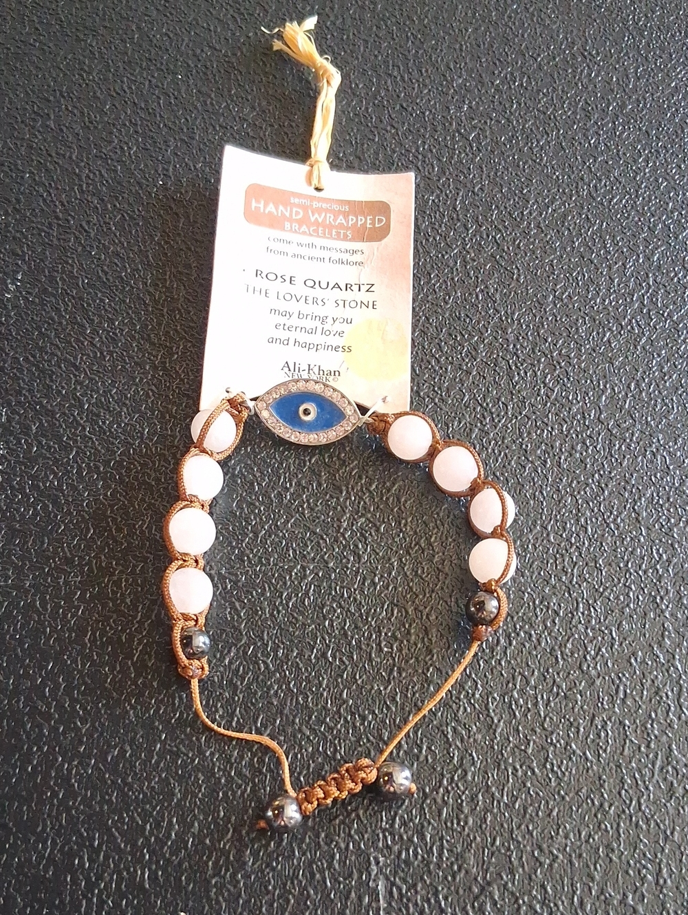 Rose Quartz Hand-Wrapped Bracelet with Blue Evil Eye Accent